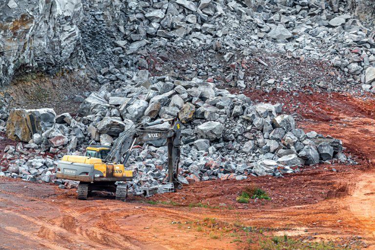 Pit Excavators Work Rock Stones